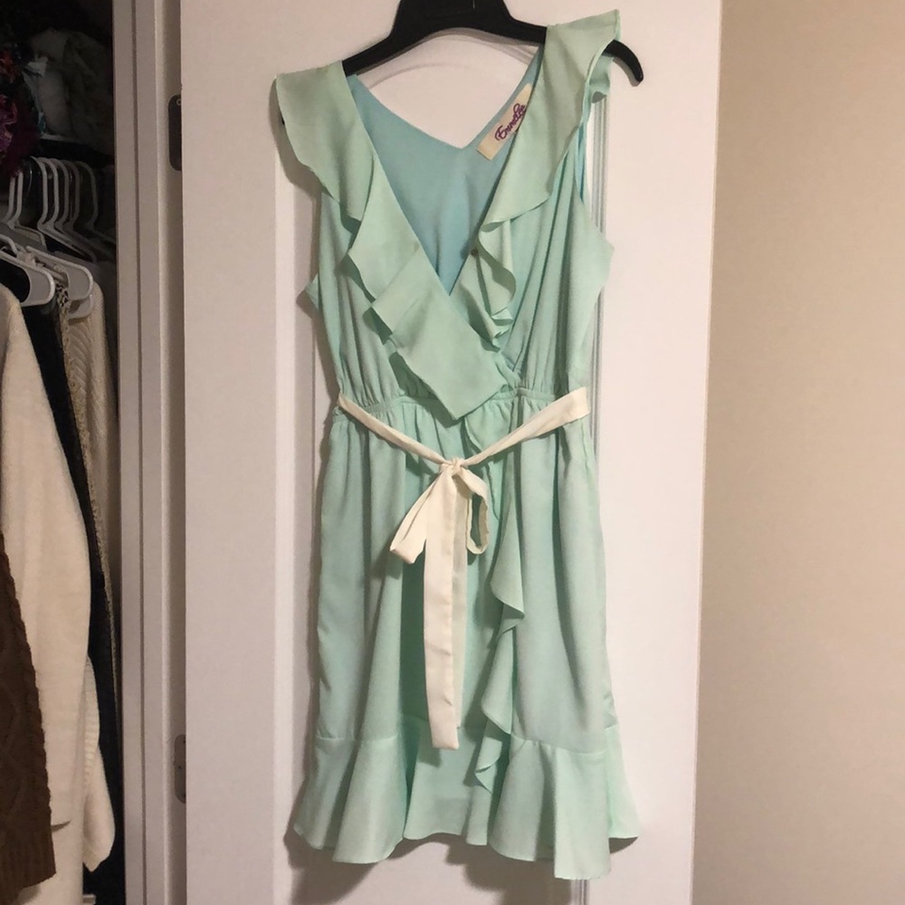 Francesca’s teal ruffle dress
